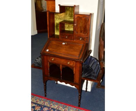 AN EDWARDIAN MAHOGANY BUREAU, the top section with an arrangement of shelves with green velour backboard, single cupboard doo