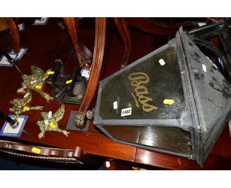 A 20TH CENTURY 'BASS'  WALL MOUNTED LANTERN, together with a cast iron Christmas tree stand, two cast irons, three graduating