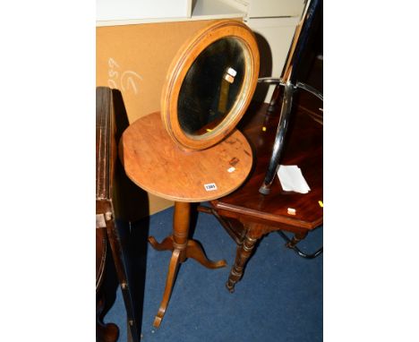 AN EDWARDIAN OAK DRESSING STAND with an adjustable circular mirror, height 125cm