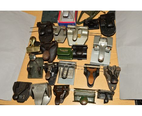 A COLLECTION OF TWENTY THREE DOUBLE HOLE PUNCHES, including a green painted Speedway Model 72 with circular wooden handle, a 