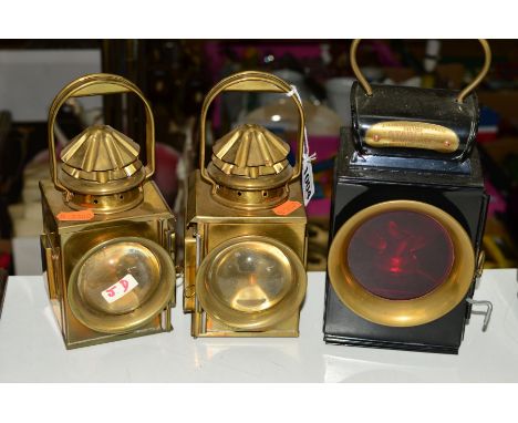 A PAIR OF J.H.HETHERINGTON CO. LTD, BRASS MOTOR LAMPS, No3 and No4, together with a 'starlite' motor lamp, with red lens (3)
