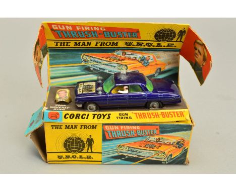 A BOXED CORGI TOYS 'THE MAN FROM U.N.C.L.E'S THRUSH BUSTER' OLDSMOBILE, No.497, version with purplish blue body and metal spo