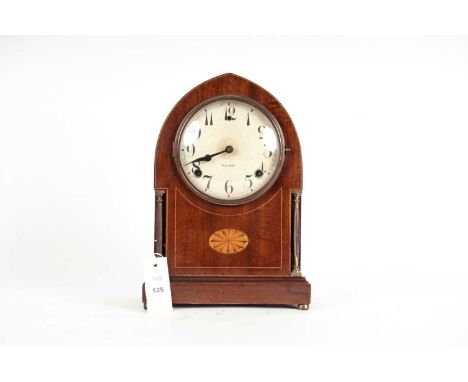 A late 19th Century American inlaid mahogany mantle clock, by Gilbert, Winsted Connecticut, USA, raised on brass bun feet, 31