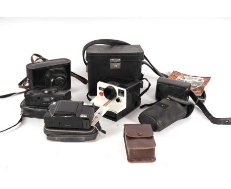 A selection of vintage cameras and cases, including: a Minolta Auto Focus V; a Minolya RIVA 100AF camera; a Zorki 4K camera w