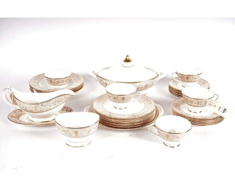 A Royal Doulton ‘Sovereign’ pattern part tea and dinner service, including: a gravy boat and saucer, a tureen and cover, five