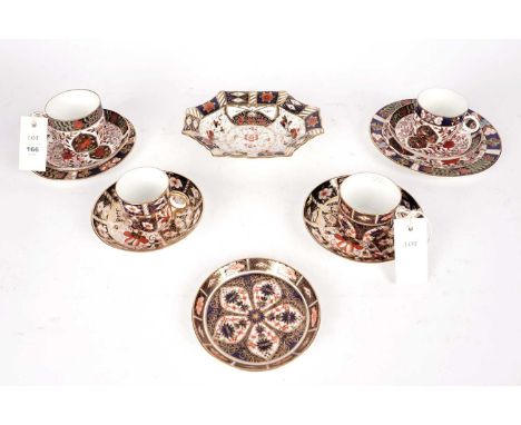 A selection of Royal Crown Derby Imari pattern tea ware, comprising: two teacups and saucers, two tea trios, and a saucer; to