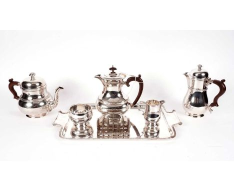 A silver plated tea and coffee service, by Charles S Green &amp; Co, with Celtic decoration, comprising: tea pot, coffee pot,