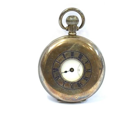 A SILVER HALF HUNTER POCKET WATCH  the white enamel face, anonymous with black Roman numerals, blue batons and one sub dial, 