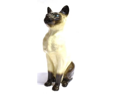 A BESWICK FIRESIDE SIAMESE CAT  model 2139, 35cm high Condition Report : old hairline along neck Condition reports are offere