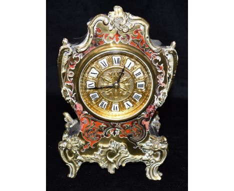 A FRENCH BOULLE MANTLE CLOCK  with rococo style gilt metal mounts, the unsigned French movement stamped '777', 24cm high Cond