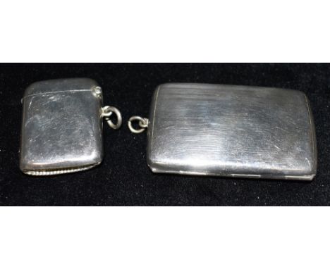 A SILVER CIGARETTE CASE and a silver vesta, the cigarette case of engine turned pattern, hallmarked for Chester 1927, measuri