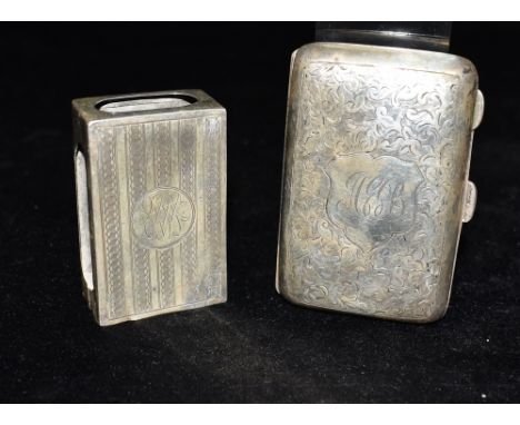 A VICTORIAN SILVER CIGARETTE CASE  and white metal match box cover, the cigarette case embossed with scroll and a monogrammed