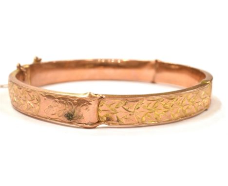 A 9CT ROSE GOLD GEORGE V BANGLE  the half patterned bangle measures approx. 5.7cm in diameter and is 0.8cm wide, hallmarked  