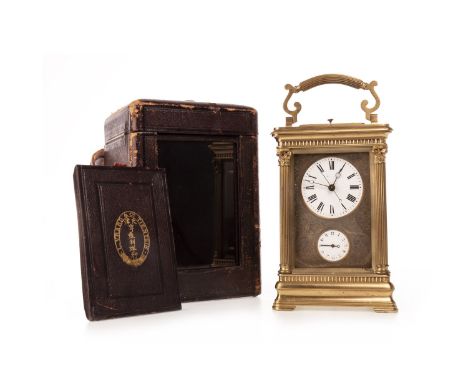 LATE 19TH CENTURY FRENCH ORMOLU REPEATER CARRIAGE CLOCK, the white enamel dial with Roman numerals, with subsidiary alarm dia