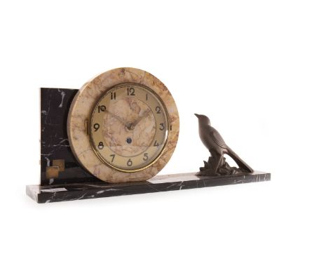 ART DECO MANTEL CLOCK, the circular dial with brass chapter ring and Arabic numerals, on an oblong base with mounted sheltere