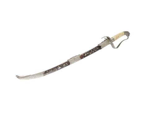 BURMESE SWORDCIRCA 1880-1900 with wide white metal knuckle guard decorated with high relief foliage, polished textured grip, 