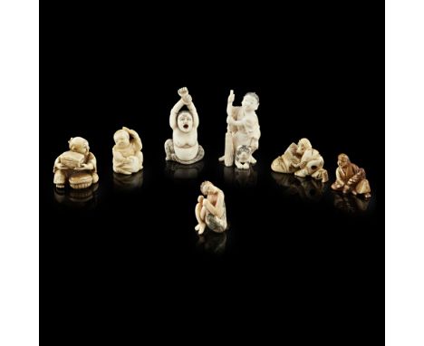 COLLECTION OF SEVEN IVORY NETSUKEONE SIGNED MASAYUKI, MEIJI PERIOD comprising: a sumo wrestler; an erotic netsuke of a female