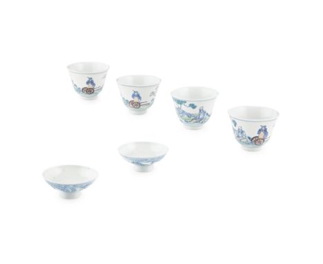 FOUR DOUCAI ENAMEL TEA CUPS AND TWO COVERSCHEN DING XUAN MARK, KANGXI STYLE BUT LATER each cup painted with a scholar resting
