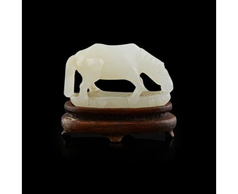 SMALL WHITE JADE CARVING OF A HORSEQING DYNASTY, 18TH/19TH CENTURY carved standing on a thin base of rippling waves, the head