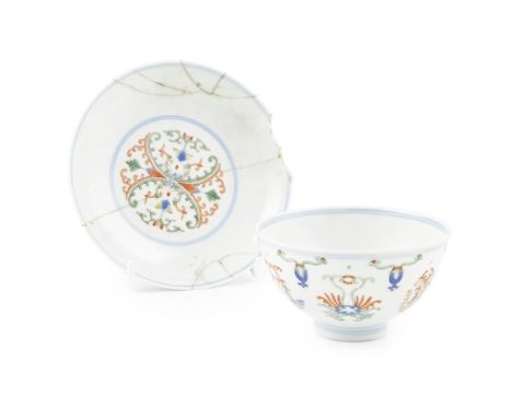 DOUCAI ENAMEL 'HONEYSUCKLE' BOWLSIX-CHARACTER DAOGUANG SEAL MARK AND OF THE PERIOD the exterior decorated with stylised honey
