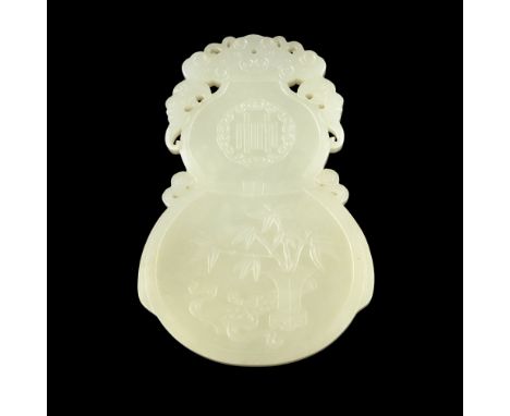 WHITE JADE DOUBLE-GOURD-FORM AMULETcarved in low relief with bamboo on the one side and prunus on the other, below a Chinese 