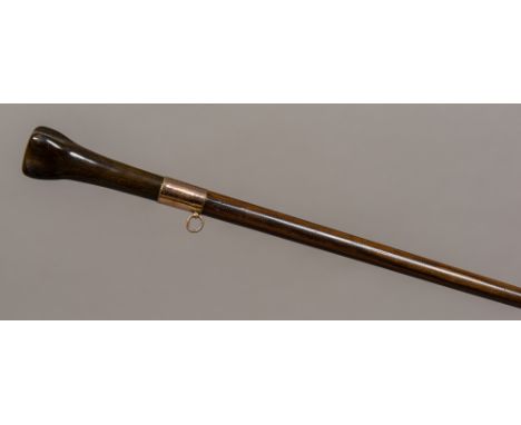 A 19th century carved bamboo walking stick 
With monkey worked handle; together with another, rosewood with horn handle and u