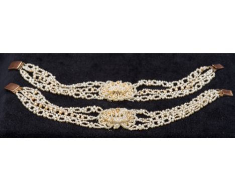 A pair of Georgian unmarked gold mounted seed pearl bracelets
Each of triple strand form.  Each approximately 16 cm long.  (2