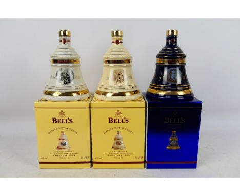 Three 70cl Bells Christmas Decanters of blended Scotch whisky, 40% abv, for 2004, 2005 and 2006, all contained in presentatio