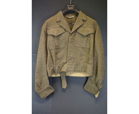 A Canadian Manufactured 1944 Dated Battle Dress Blouse In Very Good Condition, WW2 Economy Printed Cloth Royal Artillery Shou