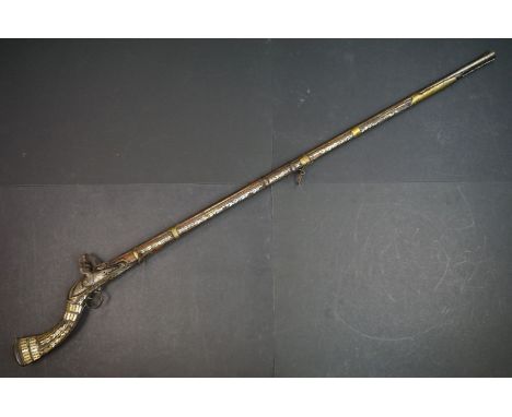 An Antique Afghan Muzzle Loading Rifle With Mother Of Pearl Inlay And British Flintlock Action. 