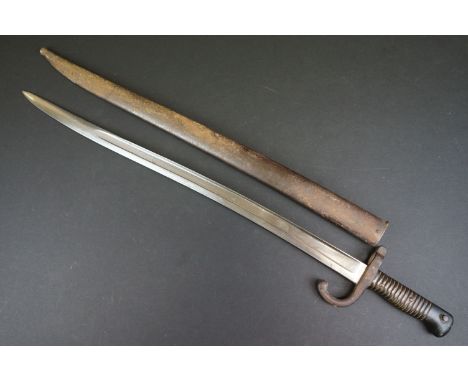 A World War One Sword Bayonet Complete With Scabbard, Blade Marked With A Star Over H. 