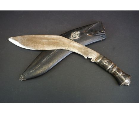 A Gurkha Kukri Knife With Black Leather Scabbard Badged To The 5th Gurkha Rifles. 