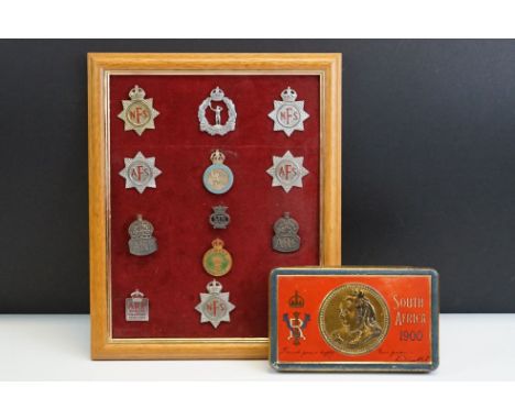 A Collection Of Framed British World War Two Badges To Include National Fire Service, Auxiliary Fire Service, Woman's Land Ar