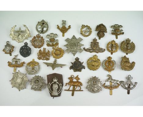 A Collection Of Approx Thirty Military Cap Badges To Include The Army Cyclist Corps, The Bedfordshire &amp; Hertfordshire Reg