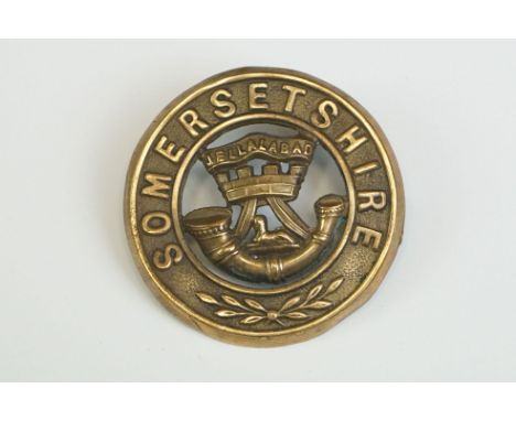 A British Military The Somerset (Somersetshire) Light Infantry Brass Helmet Centre Badge With Twin Loop Fixings To Verso. 