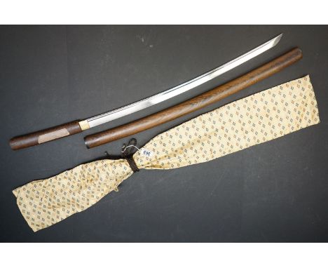 A Japanese Katana Sword, Blade Measures Approx 69cm, Tang Unsigned, Within Wooden Scabbard And Together With Silk Bag. 