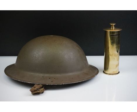 A British World War Two Brodie Helmet Together With A World War Two Trench Art Money Box Made From A 1941 Shell Case. 