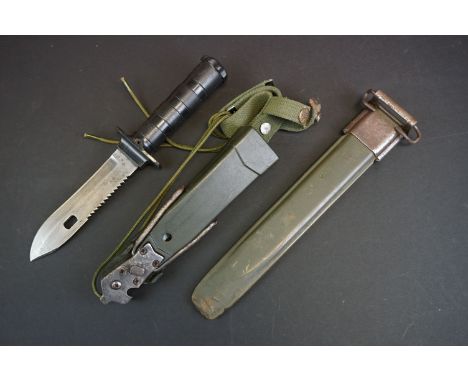 A Vintage Survival Knife Complete With Scabbard With Wire Cutting Tool Together With A United States Military Knife Scabbard.