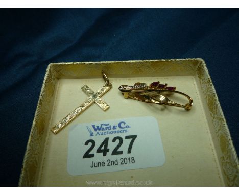 A 9ct gold Ruby set Spray Brooch, 2.1 gms and a 9ct gold Cross, weight 2.3 gms