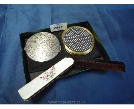 Two Compacts and a folding comb