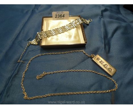 A Silver ingot Pendant and chain and a Silver gate Bracelet