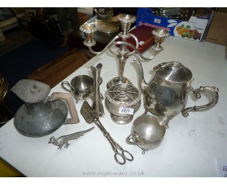 A small quantity of silver plated items including a three branch candelabrum, a small pewter teapot, a rose bowl, etc