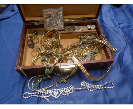 A brown leather jewellery Case with miscellaneous cufflinks, vintage jewellery, rings, handbag mirror, etc