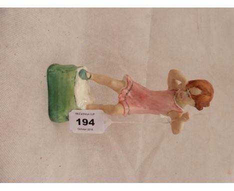 A Royal Worcester figure 'Wednesdays Child'. 7'' high