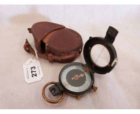 A Great War marching compass with mother-of-pearl register and leather case. Marked incuse B.L No. 70437. 1917