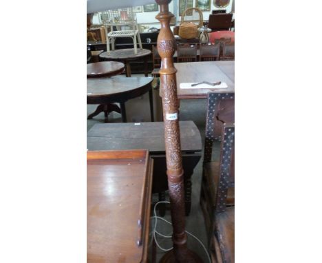 A foliate carved lamp standard