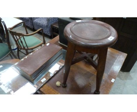 A pine stool, bookslide, projector, leather case and a mirror