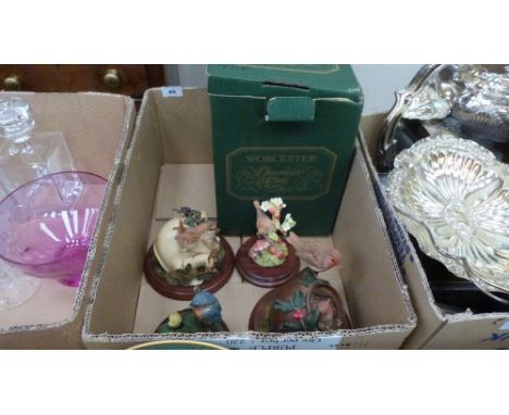 A Royal Worcester otter figure and four other resinous figures