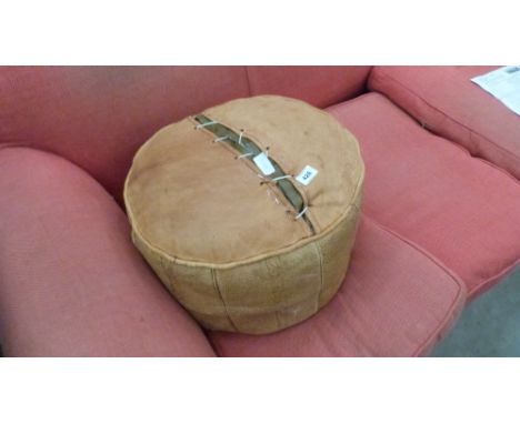 A leather pouffe