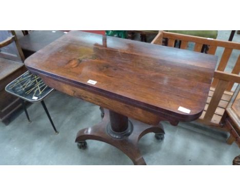 A William IV rosewood card table on plain column and quadripartite downswept base. 36'' wide